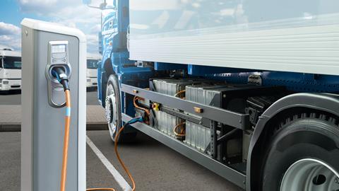 Electric,Truck,Batteries,Are,Charged,From,The,Charging,Station.,Concept