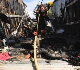 Fire crews put out the fire after the waste was removed from the lorry
